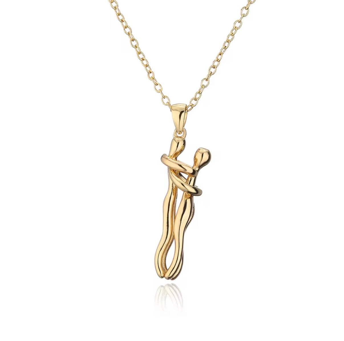 Gold pendant necklace on a white background